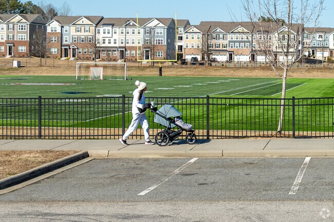 Take a stroll on the paved walking path at the Chestnut Square Park in Indian Land.
