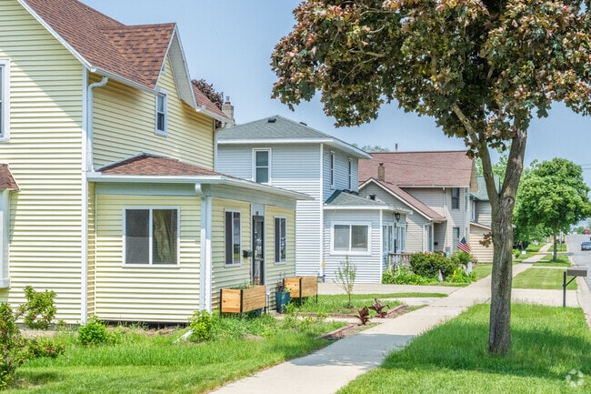 Many two-story homes in Tomah have covered patios that echo the bungalow style.