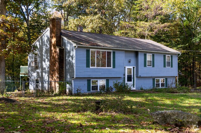 This wooded split-level resides in Wales.