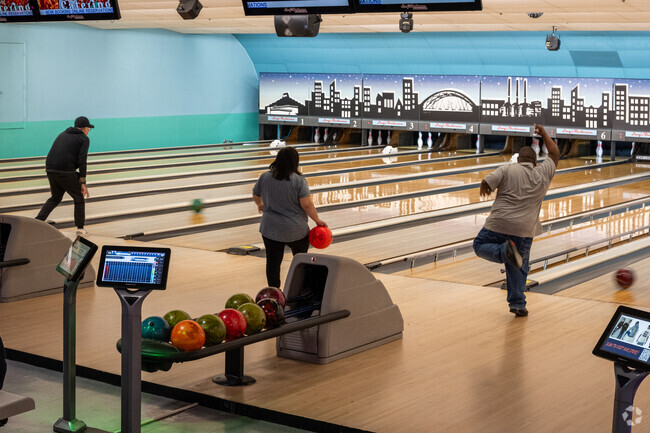 Roll strikes and spares at Lang's Bowlarama in Arlington, RI.
