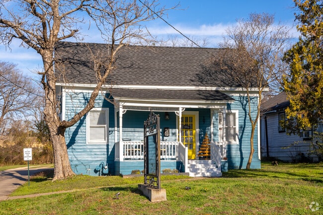 Small, colorful cottages are scattered throughout Waxahachie.