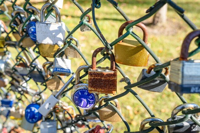 You can find the Locks of Love in Williamsville right next to Glen Falls parking.