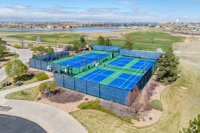 Whether you're a beginner or seasoned player, the tennis courts at Heritage Todd Creek offer a welcoming environment for all skill levels.
