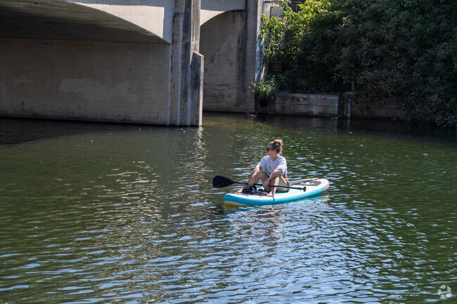 Just minutes from Ben Lomond, the San Lorenzo River offers calm waters perfect for paddleboarding, where locals enjoy peaceful moments surrounded by redwoods and mountain air.