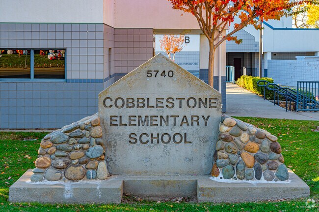 Unique monument sign welcomes locals to Cobblestone Elementary School.