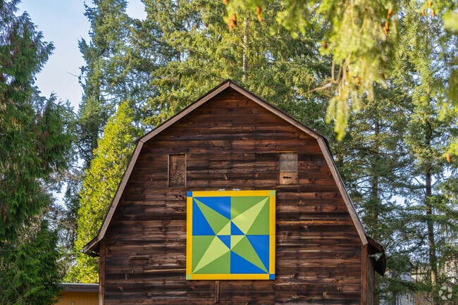 Geometric barn art adorns the farmland around Bull Mountain.