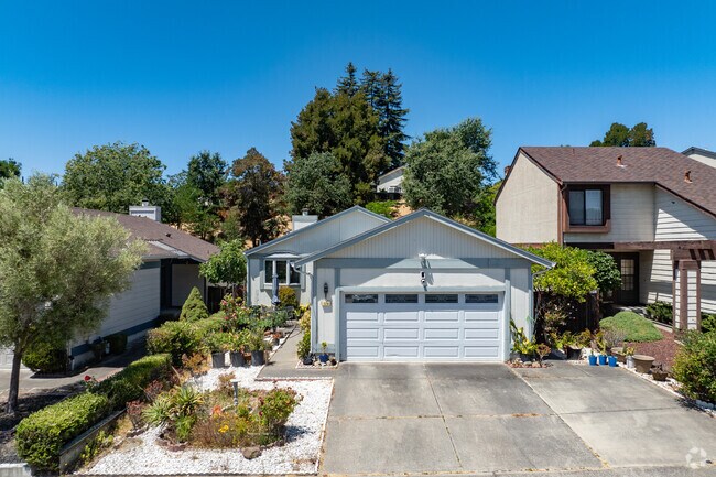Foxboro homes are situated on hills with views and lots of foliage.