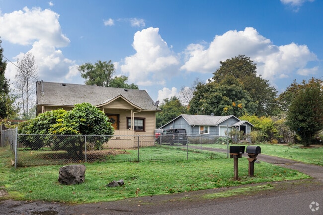 Modest residential homes seen in the Glenwood-Springfield neighborhood.