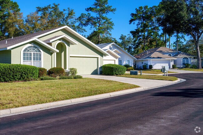 A row of homes showcases beautiful landscaping in Rosemont.