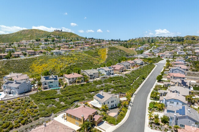 Homes with lake views are seen in Tuscany Hills.