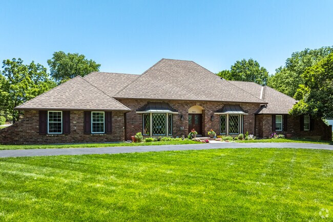 French Country homes in private roads can be found in the Platte Woods neighborhood.
