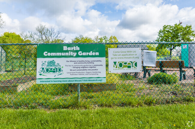 A community garden sits on the edge of the Barth Elementary School property.