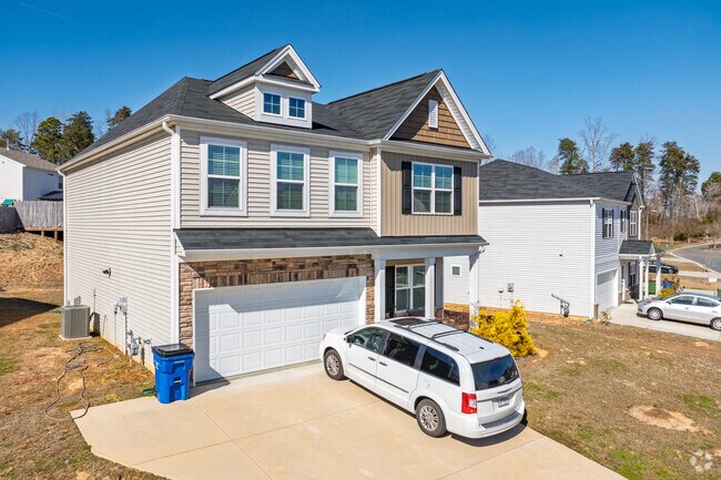 New Traditional homes in Elon sit on large lots.