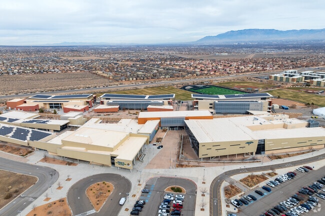 A view of Atrisco Heritage Academy High Schoo withe the Sandia Mountains in the back.