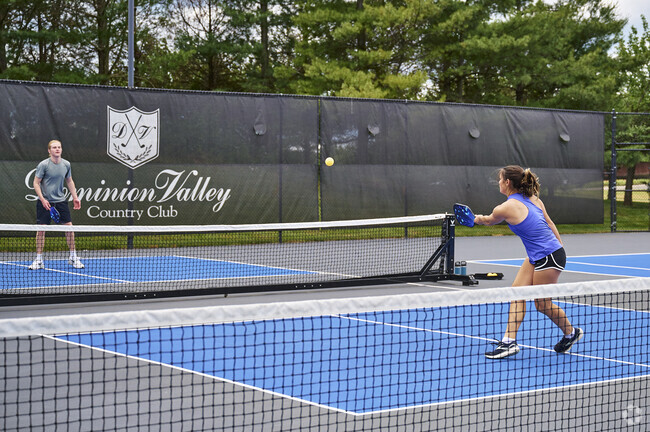 Dominion Valley Country Club is a short drive away from Sudley Springs.