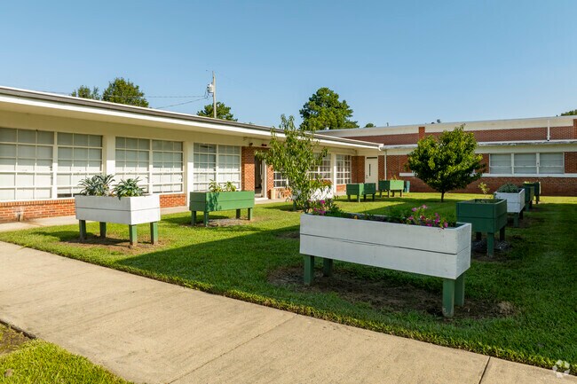 Classroom gardens and other outdoor activities are available at H.L. Trigg Community School.
