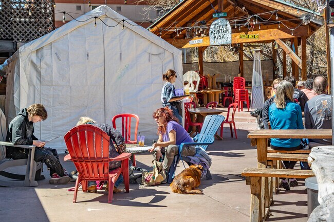 Spend a summer afternoon catching up with friends on Cactus Jack's river-side patio near Hiwan Hills.