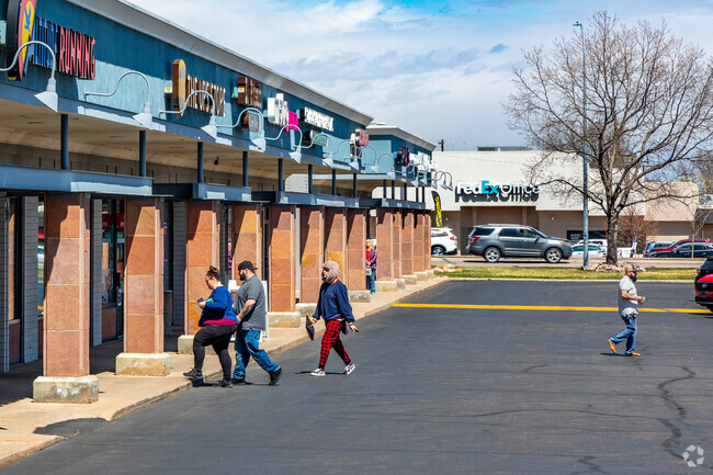 W 10th St just south of Stoneybrook has a few commercial centers where residents can go shopping.