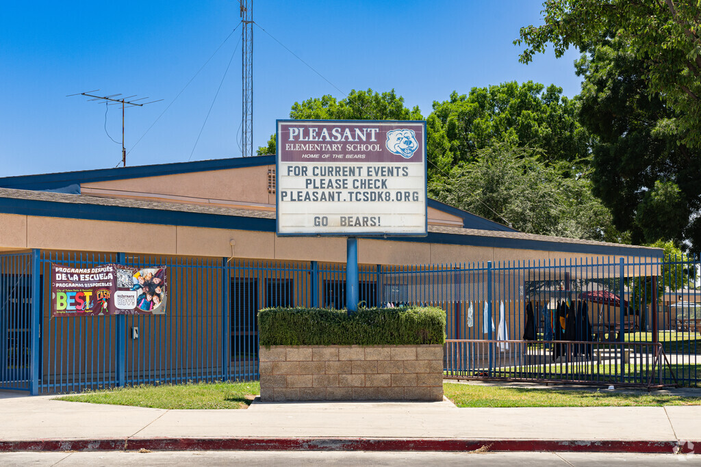A large marquee outside the entrance to Pleasant Elementary School informs parents of events.