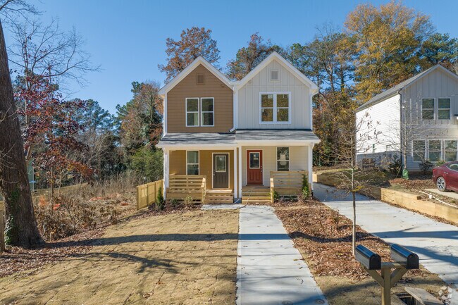 Newly built cottages feature long side-yard driveways.