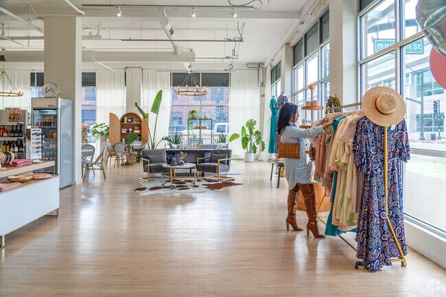 The Wyckwood House, a boutique in Downtown Aurora, has a cocktail bar for patrons to enjoy.