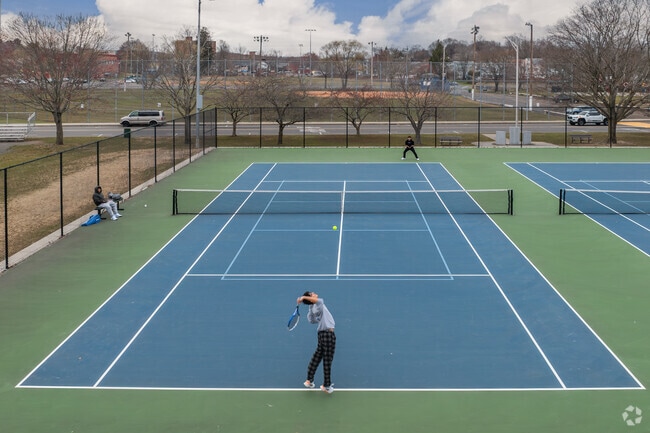 Take a stroll through Rogers Park in Danbury, with fields and courts for sports enthusiasts.