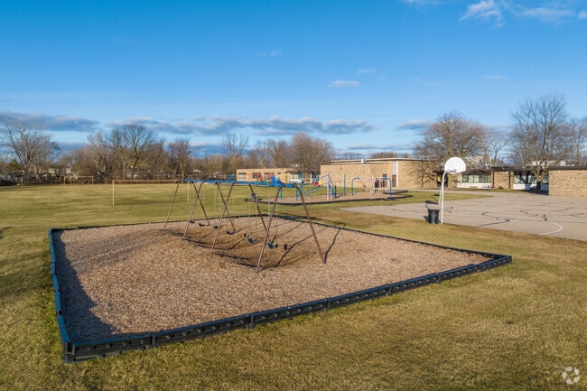 Play on the playground at Salk Elementary School.