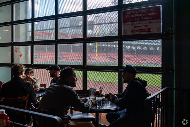Bleacher bar in Fenway gives guests a field level view into the park.