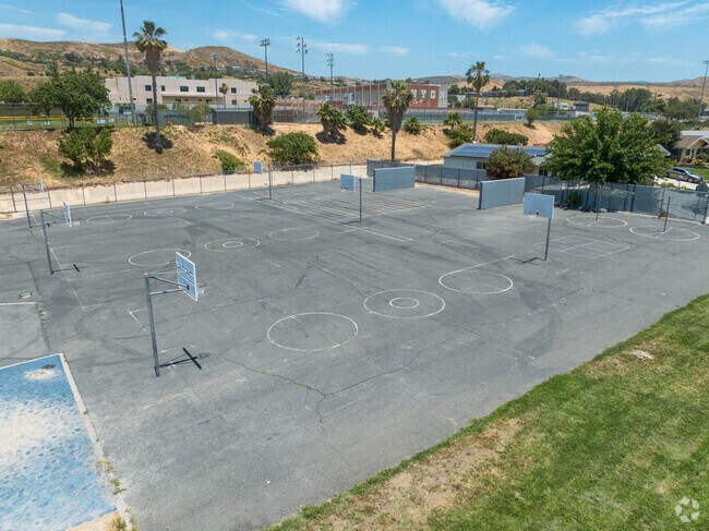 Students spend recess on basketball courts at Cedarcreek Elementary School in Canyon Country.