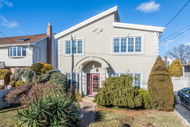 Newly constructed colonial style homes offer modernity in classic North Massapequa.