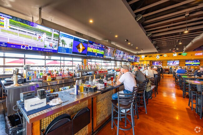 Relish the vibrant atmosphere at Cold Beers & Cheeseburgers near Glennwilde Groves.