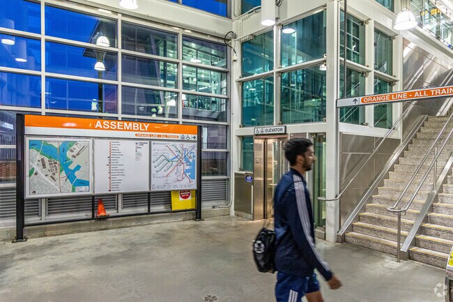 Commuters in Ten Hill use the bus and the orange line train to get around.