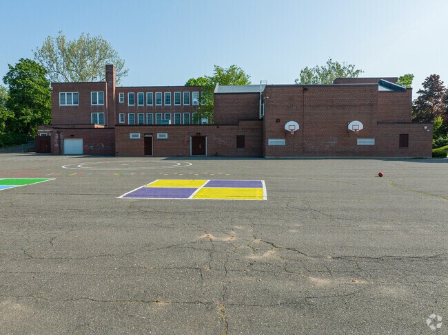 The back of the Union School has a full blacktop for a lot of activities.