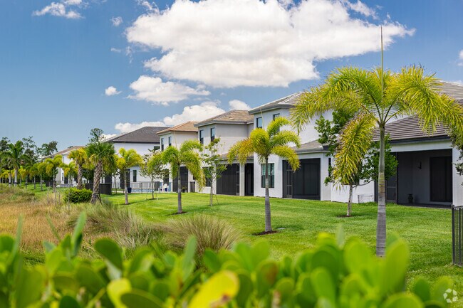 Homes in Rivercreek are surrounded by greenery.