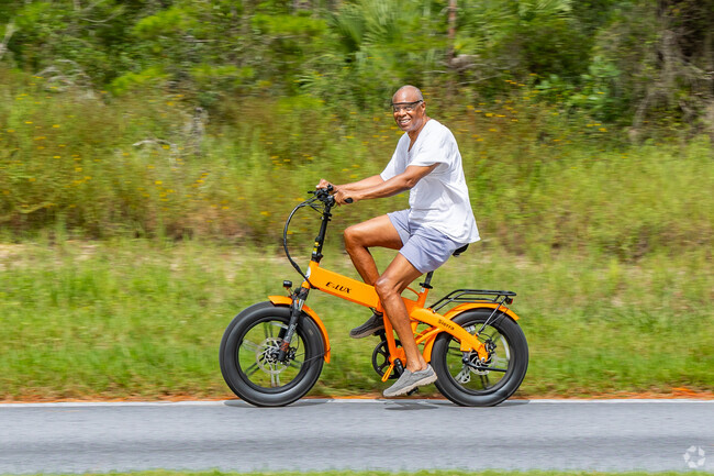A wonderful bike ride brings a smile to your face in Cypress Village at Sugarmill Woods.