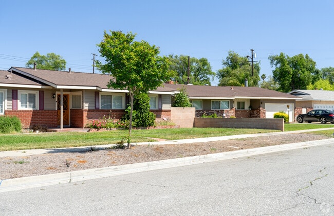A row of ranch homes line up one of the streets in the Romona neighborhood.