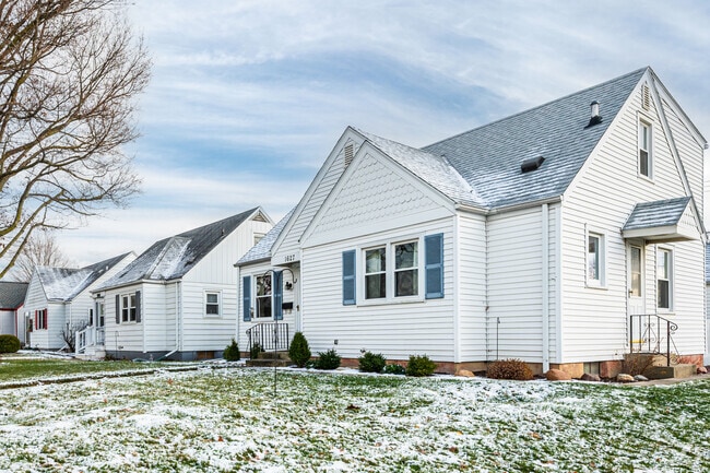 Single-story ranch-style houses in a row.
