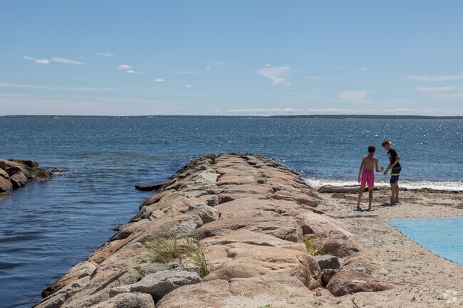 Two friends talk plans before heading out on the jetty in Teaticket.