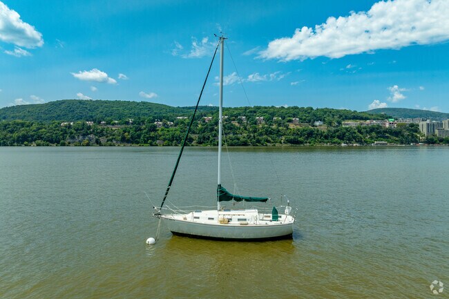 Boaters take advantage of calm waters near the Philipstown shoreline.