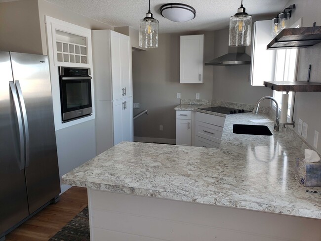 New Kitchen. Stove top separate from built in oven. Dish washer / dish disposal.
