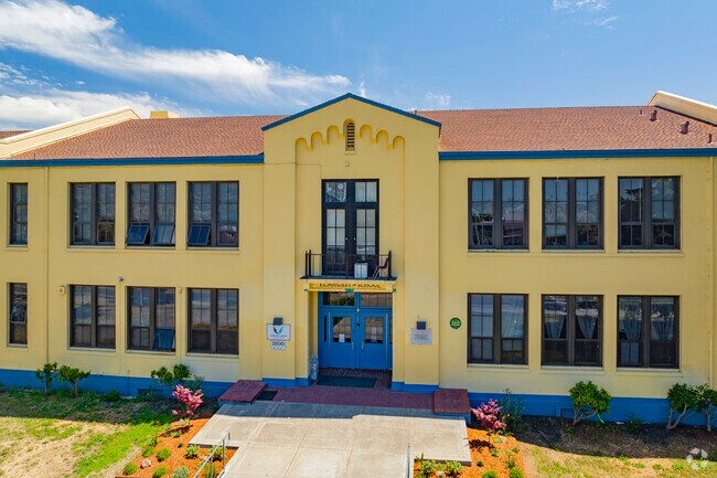Elmhurst United Middle School in Highland, Oakland, California, newly painted exterior.