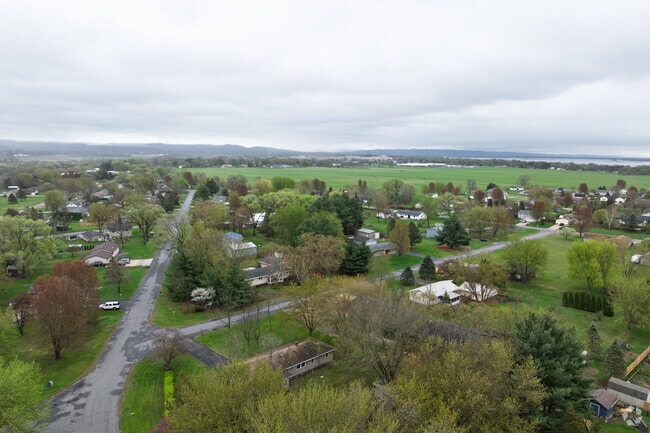 Established streets sit beside open farmland across Brice Prairie.