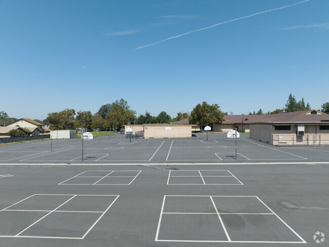 Creek View Elementary School offers several basketball and four square courts.