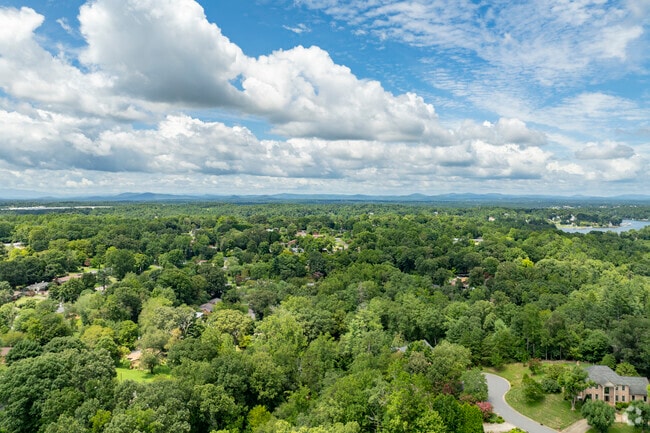 Forest Hills is aptly named for the beautiful old growth trees and rolling hills of the area.