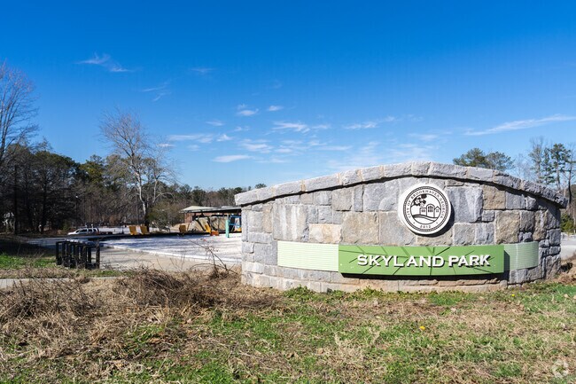 Skyland Park features a dog park, sand volleyball courts, and a scenic walking trail.