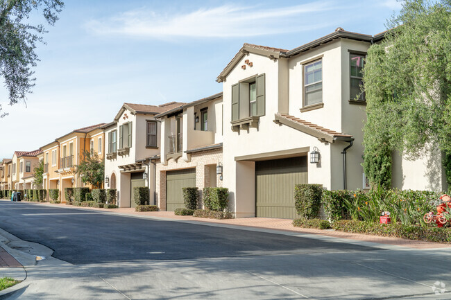 Modern condos in Orchard Hills, blending convenience with scenic hillside views.
