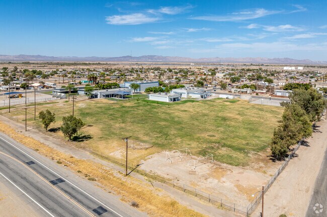 Grace Smith Elementary School has open grassy fields for sports.