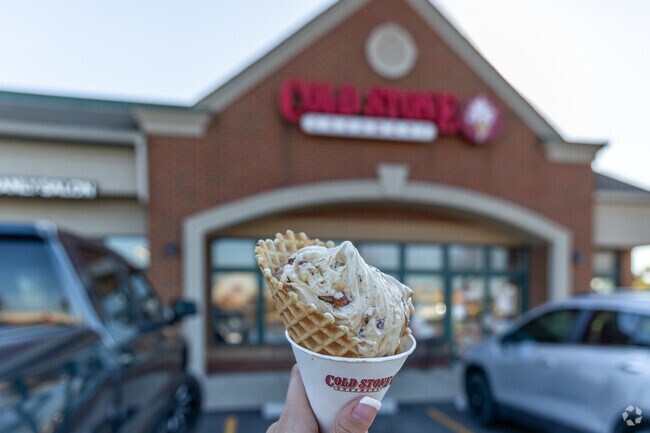 Coldstone Creamery creates freshly mixed topping inside their icecream near Stocker.