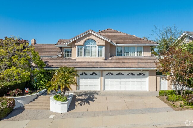Larger Turtle Rock homes feature three-car garages on larger plots of land.