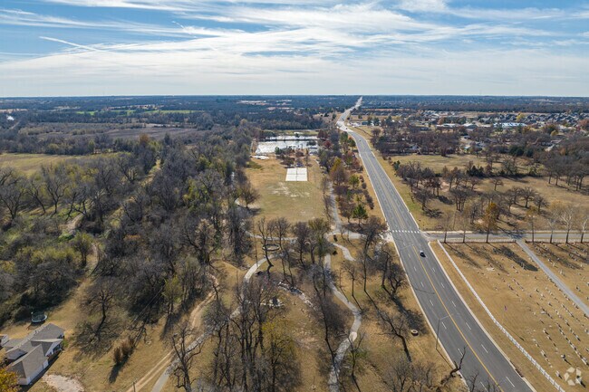 Harrah Heritage Park and Walking Trail sits across from Russell Babb Elementary School.